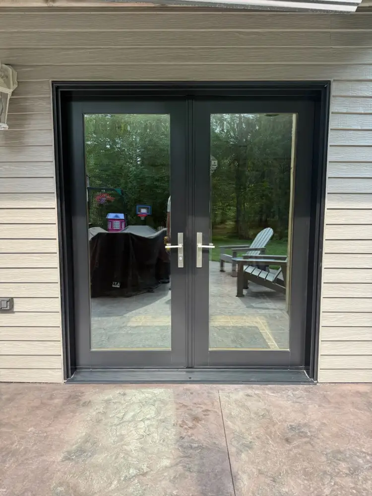 New black-framed French patio doors
